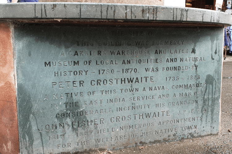A broad stone plaque dedicated to the original Keswick Museum